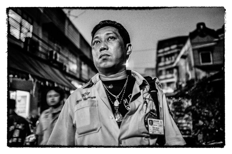 Bangkok paramedic outside Por Tech Tune